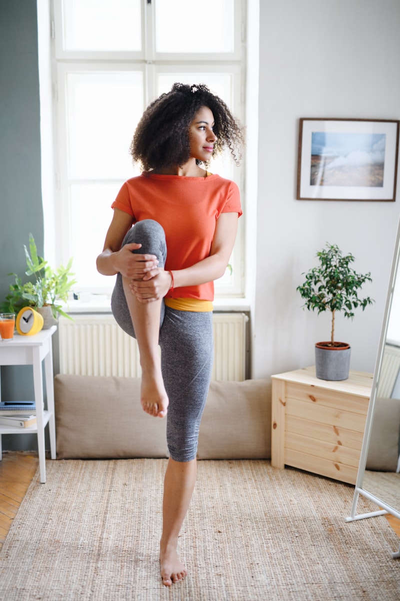 Happy woman exercising at home - complete home workout guide for beginners